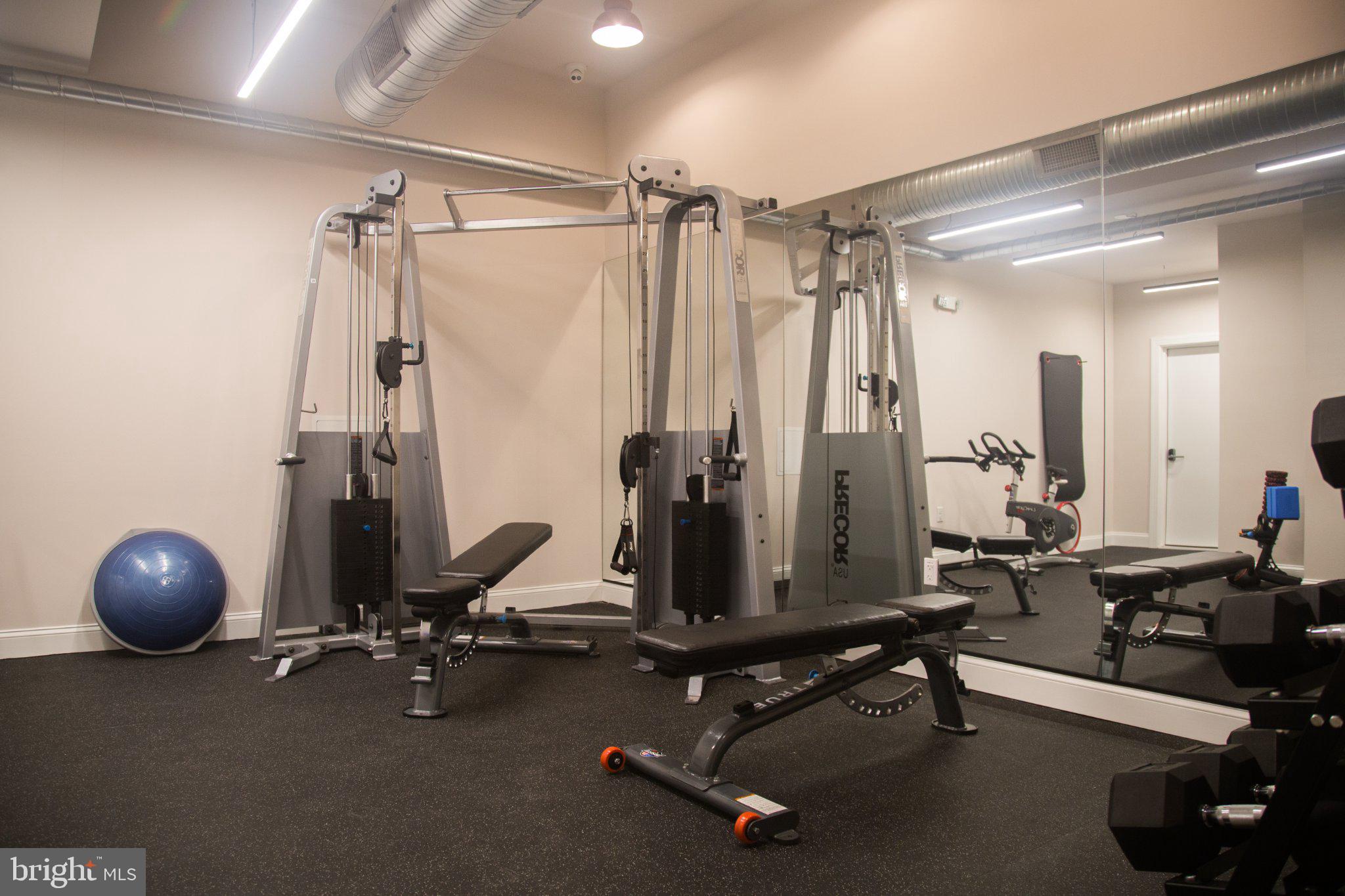 600 North Howard Street, Unit 101 Baltimore, MD 21201 - Photo 19 of 36 a view of a room with gym equipment