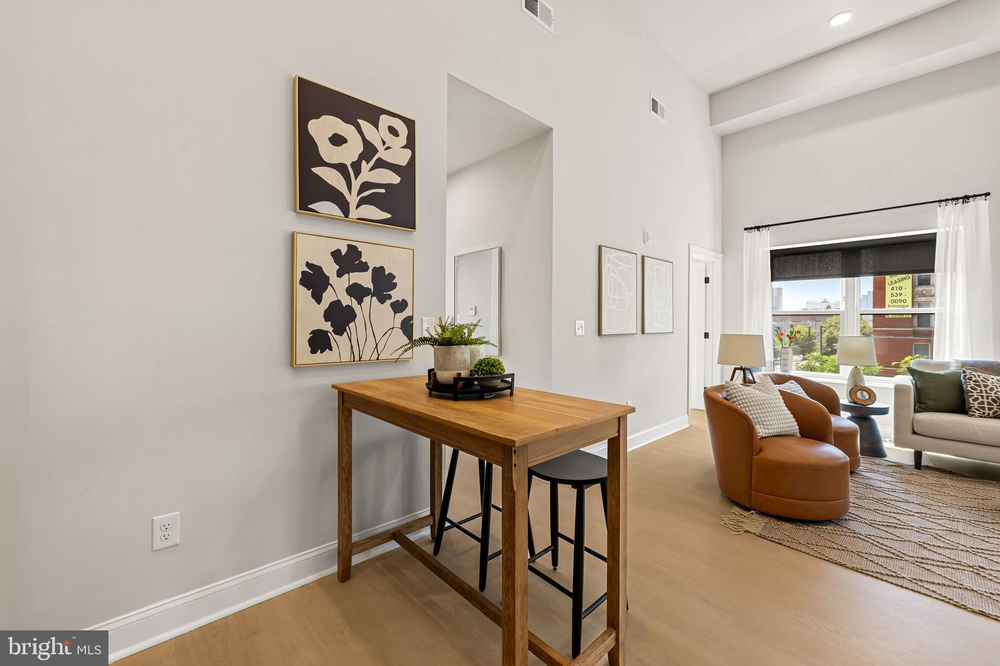 600 North Howard Street, Unit 101 Baltimore, MD 21201 - Photo 9 of 20 a view of a livingroom with furniture and window