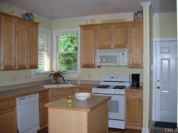608 Scotts Ridge Trail Apex, NC 27502 - Photo 5 of 10 Large kitchen with island, gas range, maple cabinets, and more. Other