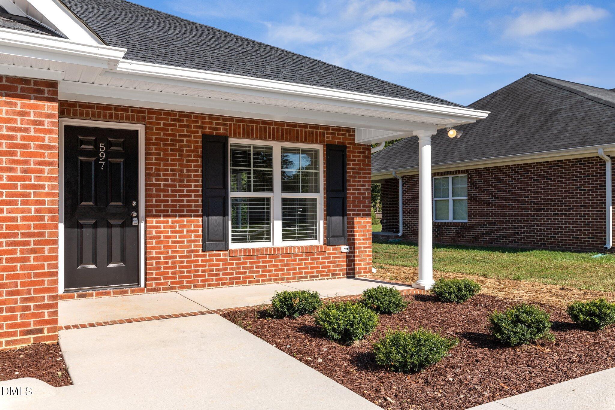 597 Pendergraft Road Bunnlevel, NC 28323 - Photo 3 of 21 a front view of a house with a yard
