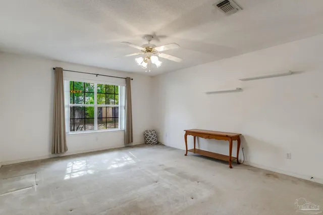 a bathroom with double sink and a mirror