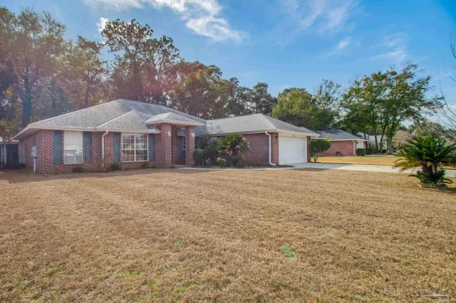 a view of a house with swimming pool