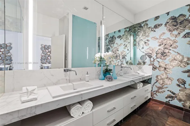 a bedroom with a bed dresser and a window