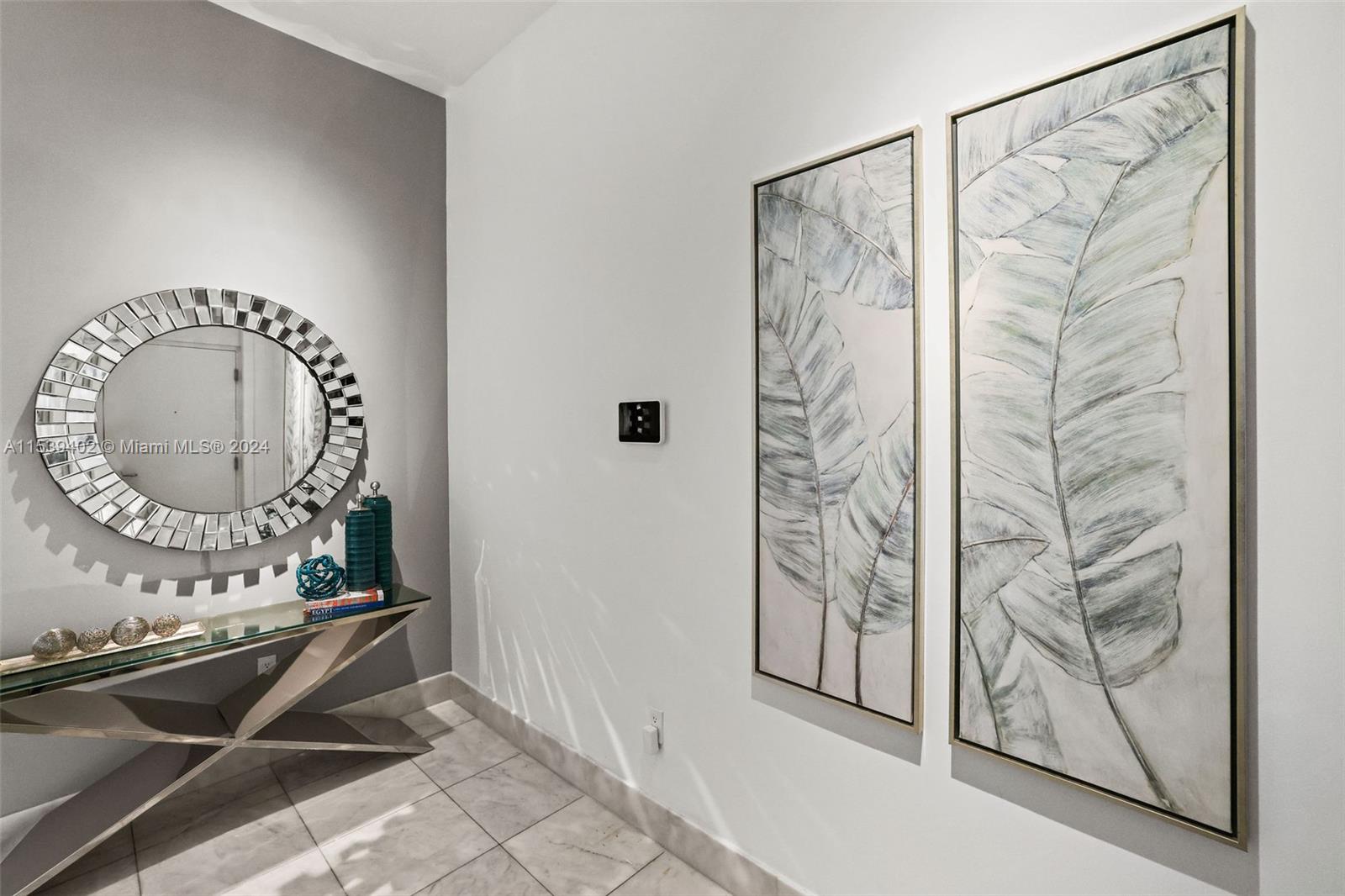 2001 Meridian Avenue, Unit 101 Miami Beach, FL 33139 - Photo 39 of 66 a room with a mirror and a shower