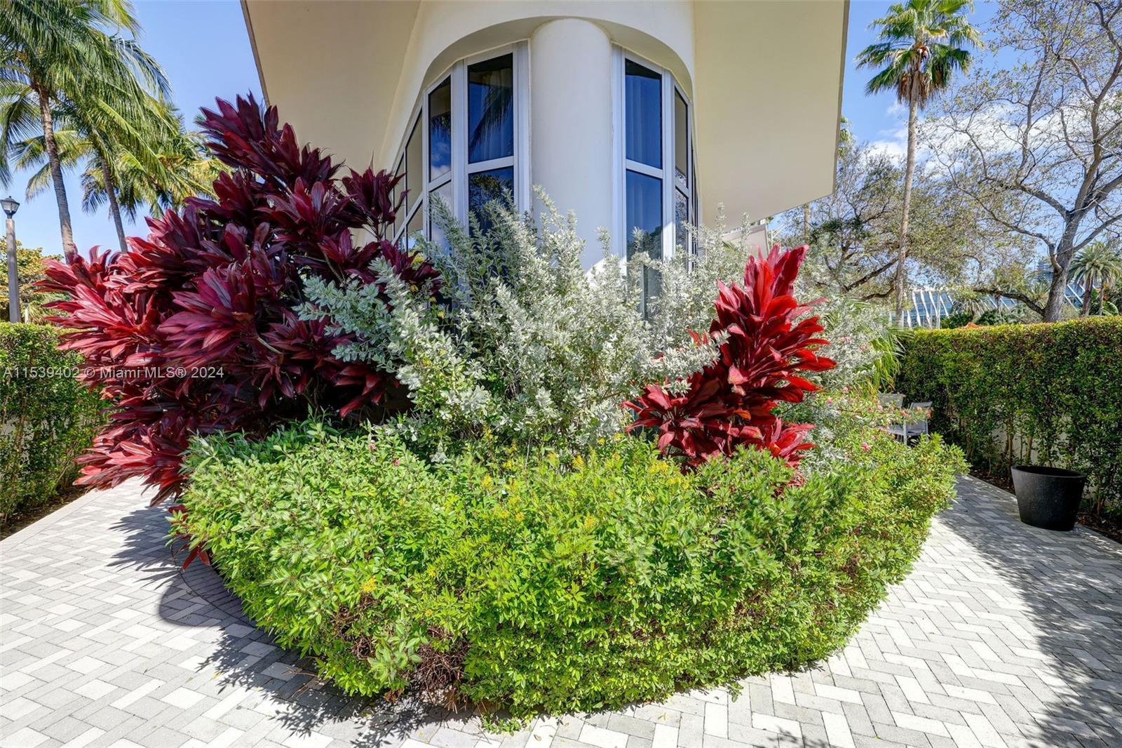 2001 Meridian Avenue, Unit 101 Miami Beach, FL 33139 - Photo 45 of 66 a view of a garden with flowers