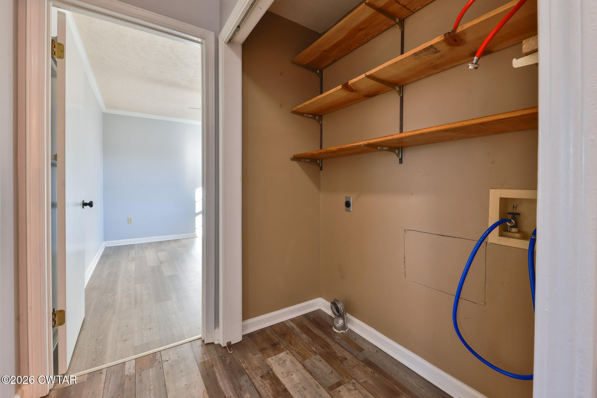 180 Everett Road McKenzie, TN 38201 - Photo 12 of 27 a view of a room with wooden floor