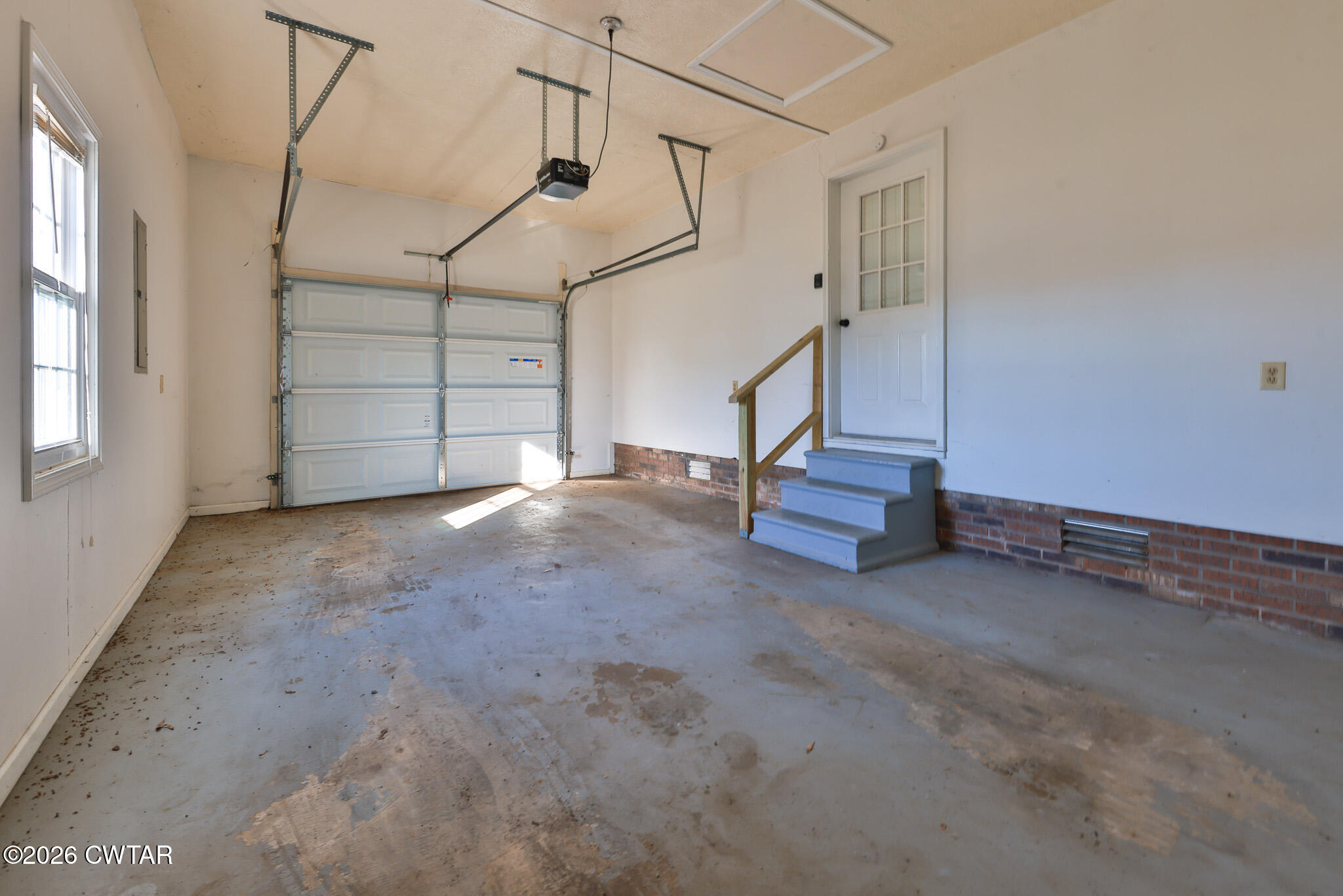 180 Everett Road McKenzie, TN 38201 - Photo 13 of 27 a view of a room with stairs and white walls