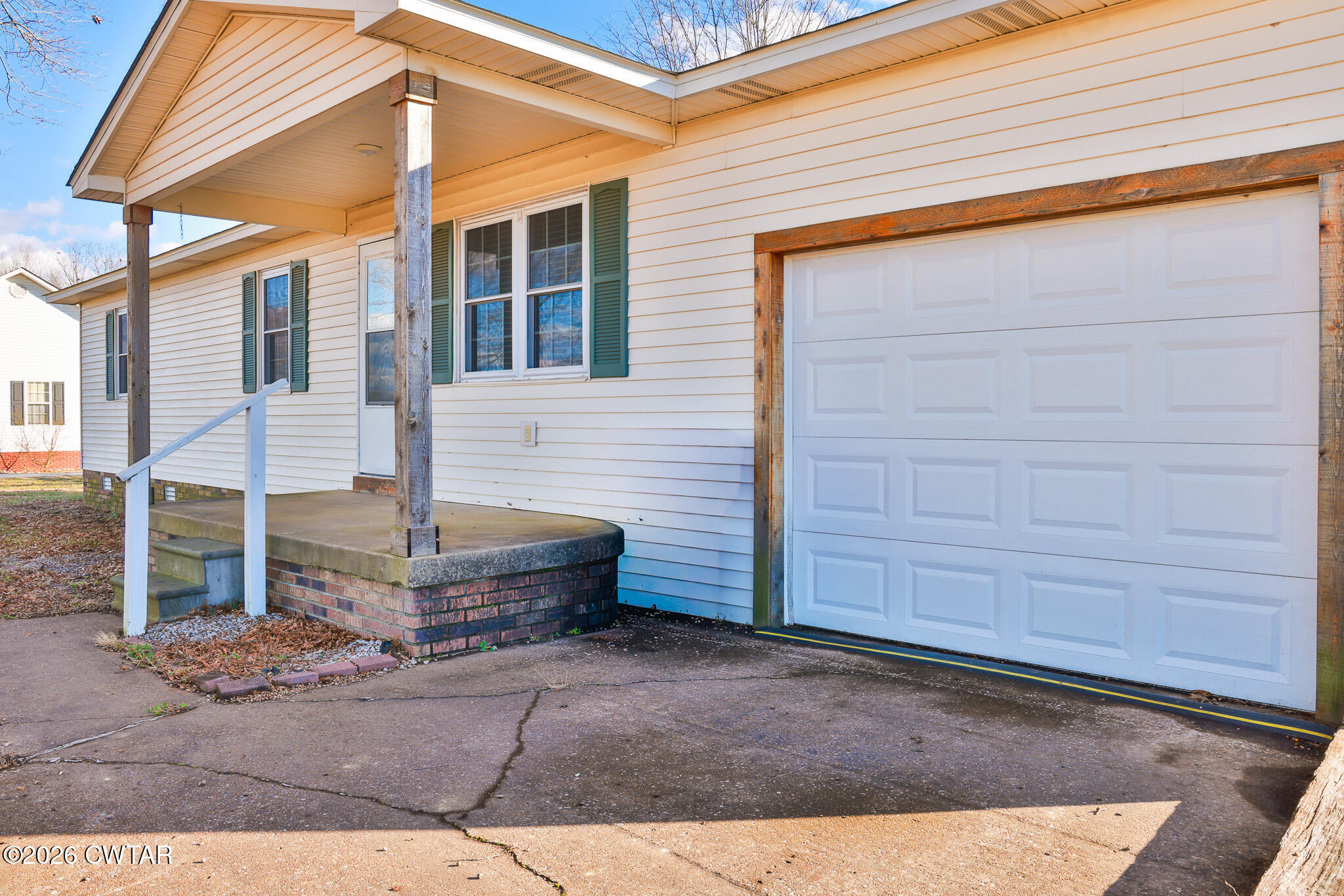 180 Everett Road McKenzie, TN 38201 - Photo 19 of 27 a backyard of a house