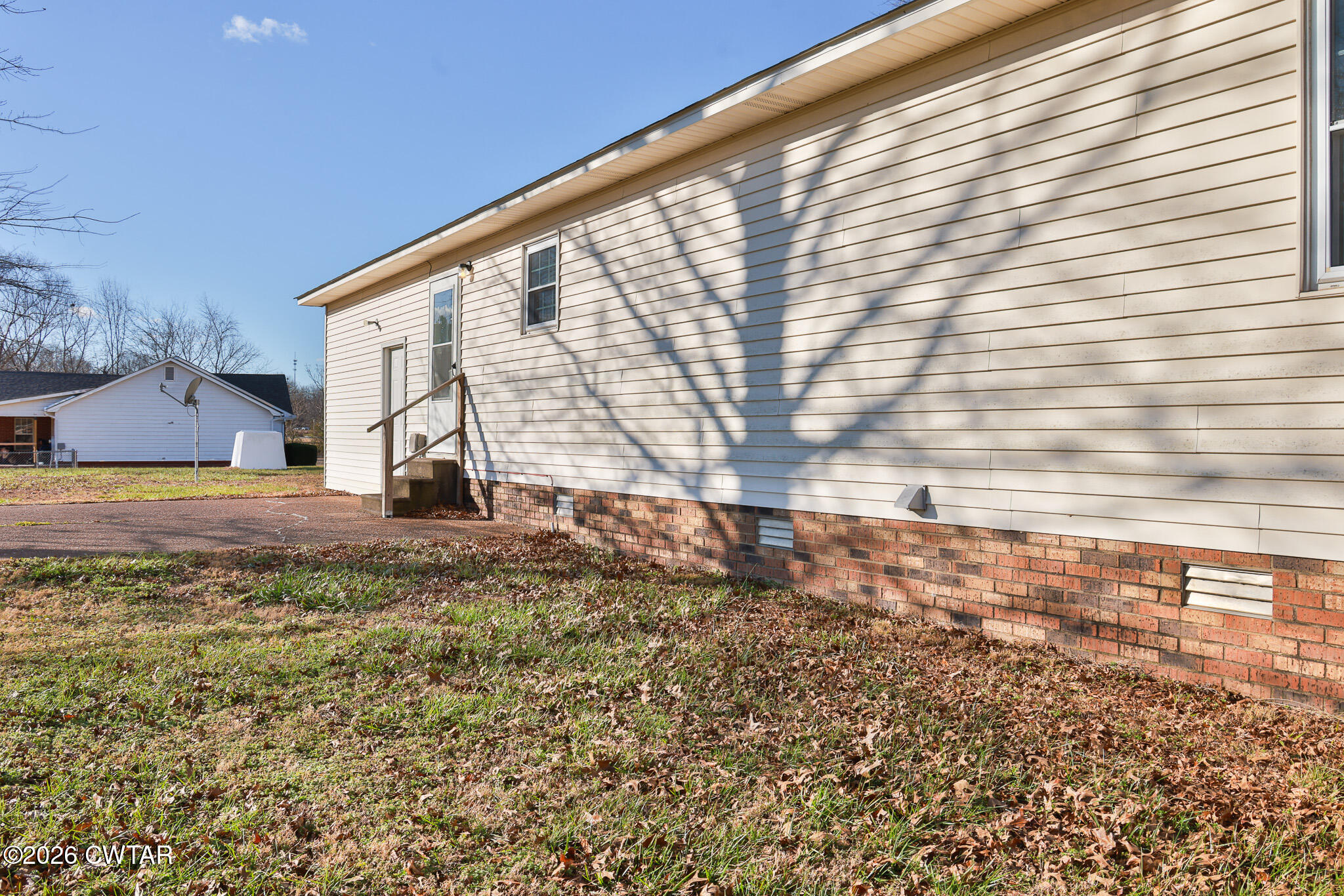 180 Everett Road McKenzie, TN 38201 - Photo 26 of 27 a view of house with backyard