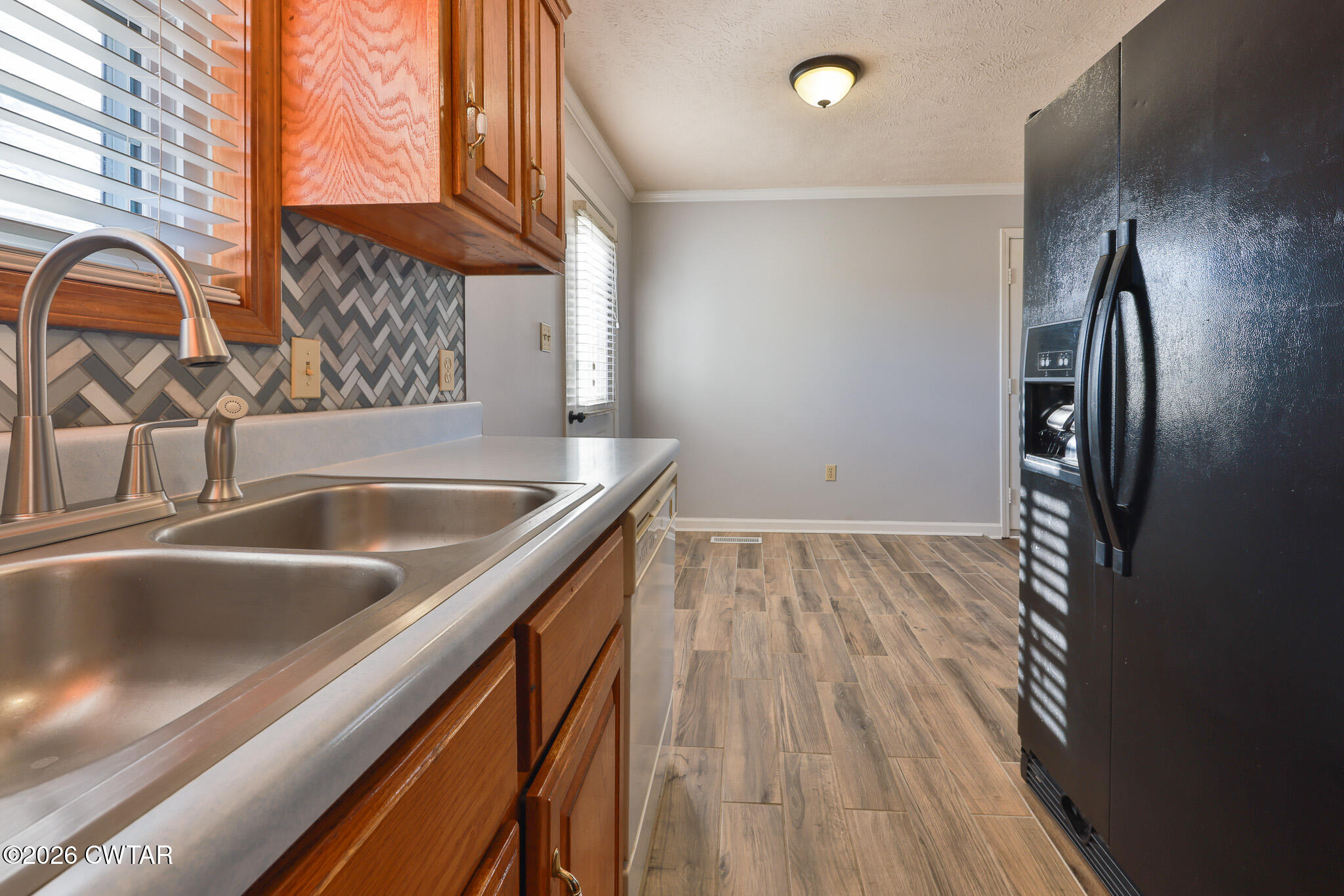 180 Everett Road McKenzie, TN 38201 - Photo 7 of 27 a close view of sink and tap