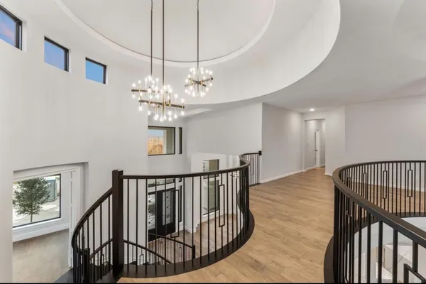 a view of entryway with wooden floor