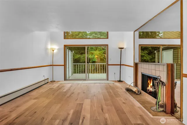 a view of a bedroom with a fireplace