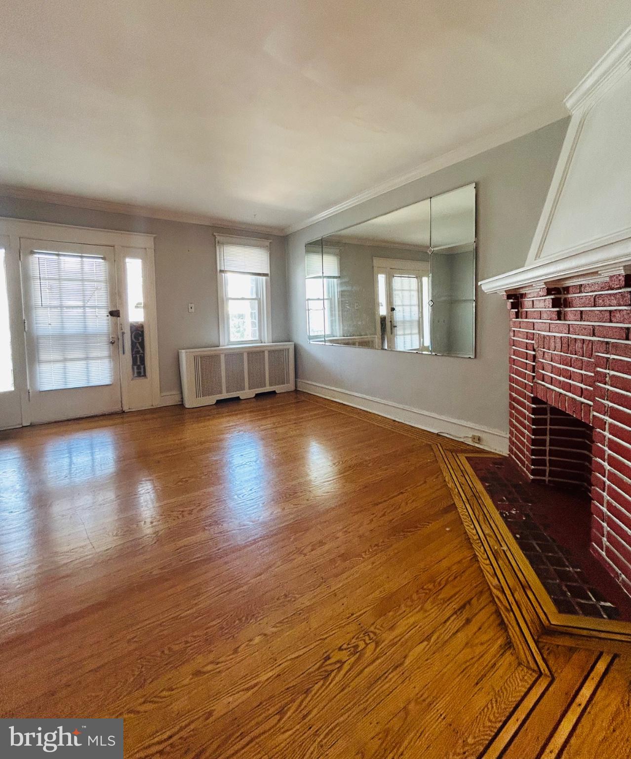 244 Huntley Road Upper Darby, PA 19082 - Photo 4 of 20 Spacious living area with classic charm.