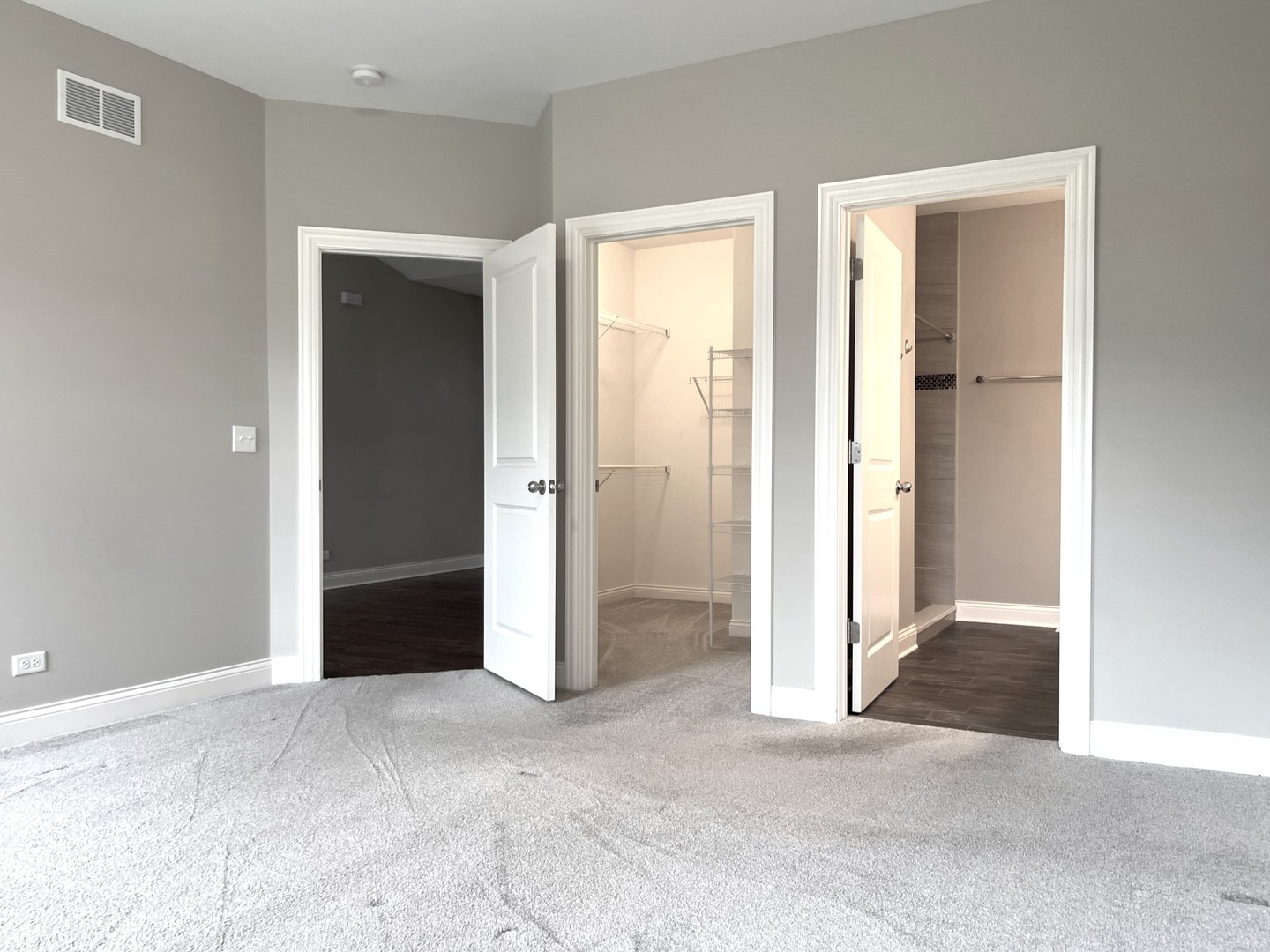 855 Meadow Lane Marengo, IL 60152 - Photo 17 of 22 an empty room with windows and a closet