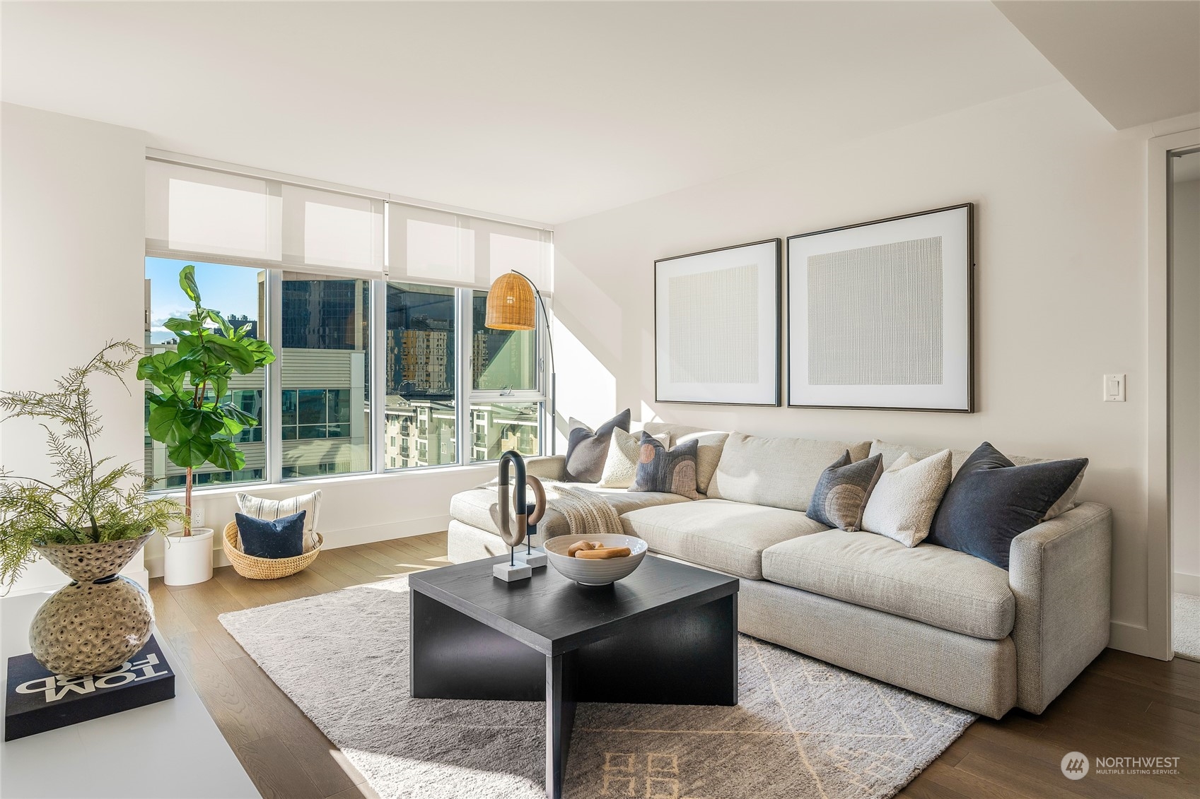 583 Battery Street, Unit 812N Seattle, WA 98121 - Photo 2 of 37 a living room with furniture and a large window