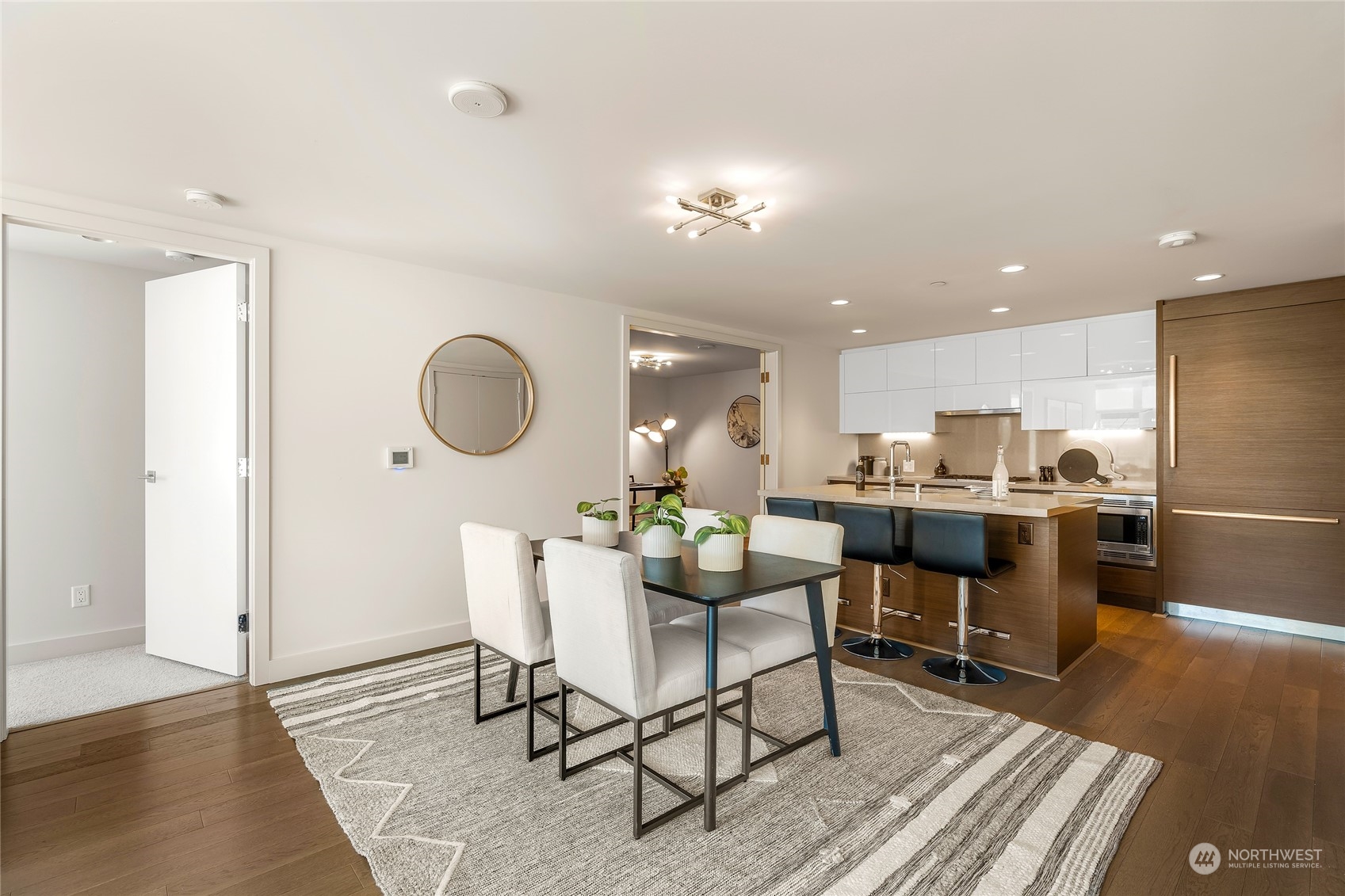583 Battery Street, Unit 812N Seattle, WA 98121 - Photo 4 of 37 a view of a dining room with furniture