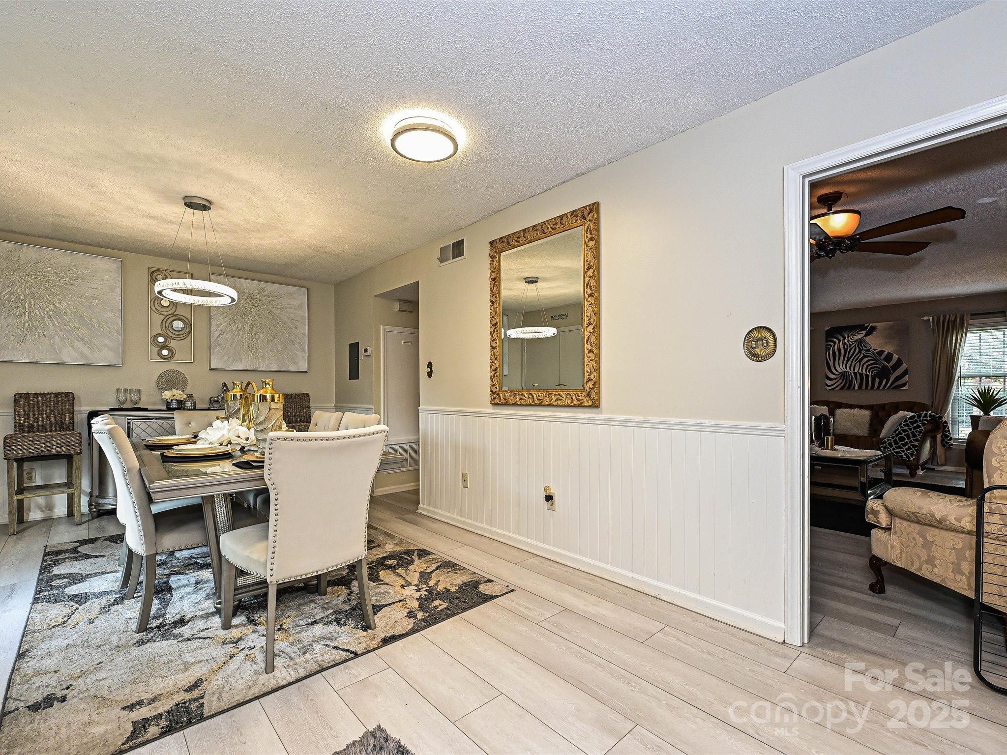 4520 Central Avenue, Unit H Charlotte, NC 28205 - Photo 11 of 28 a view of a dining room with furniture and window
