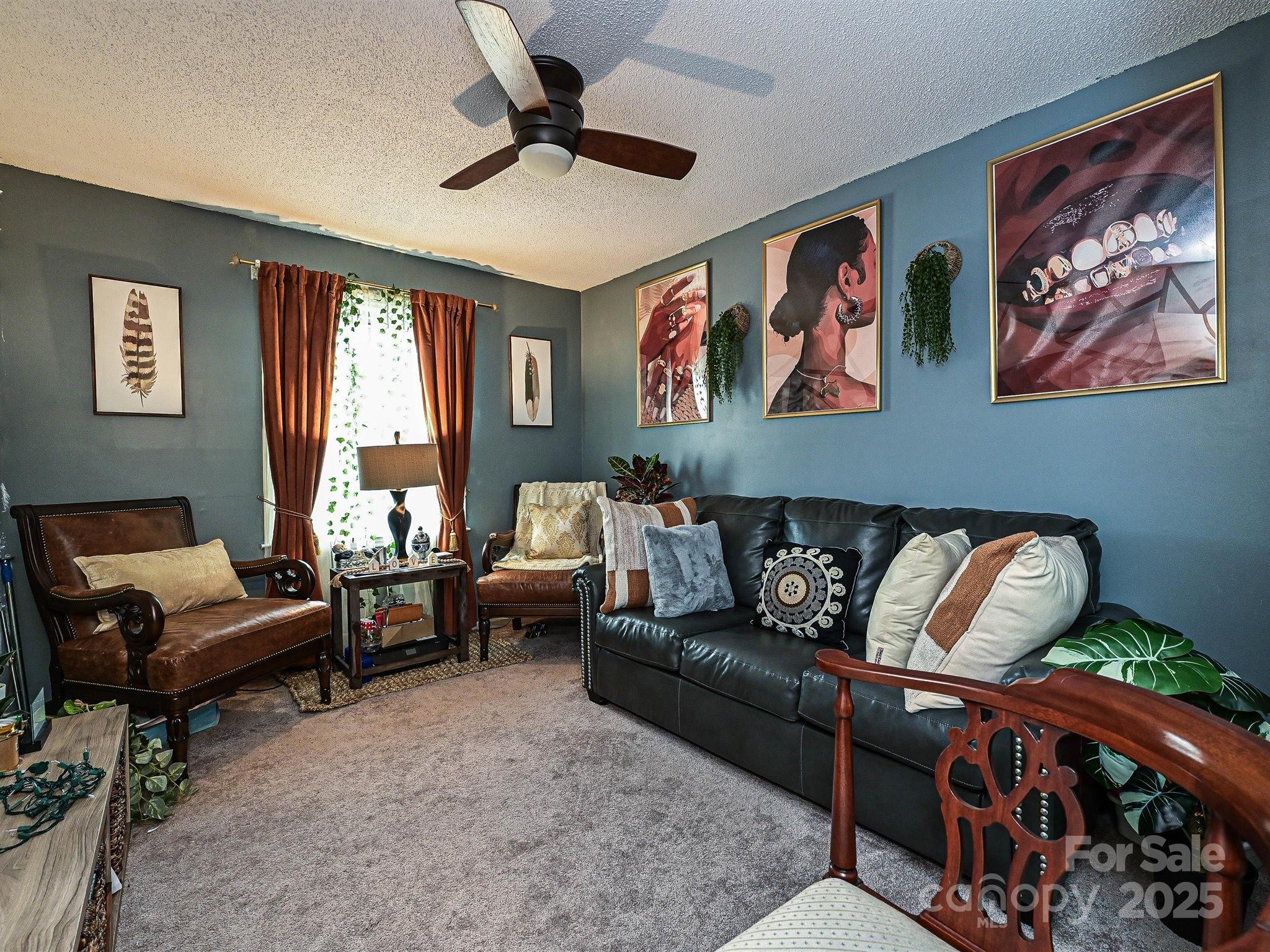4520 Central Avenue, Unit H Charlotte, NC 28205 - Photo 21 of 28 a living room with furniture and a window