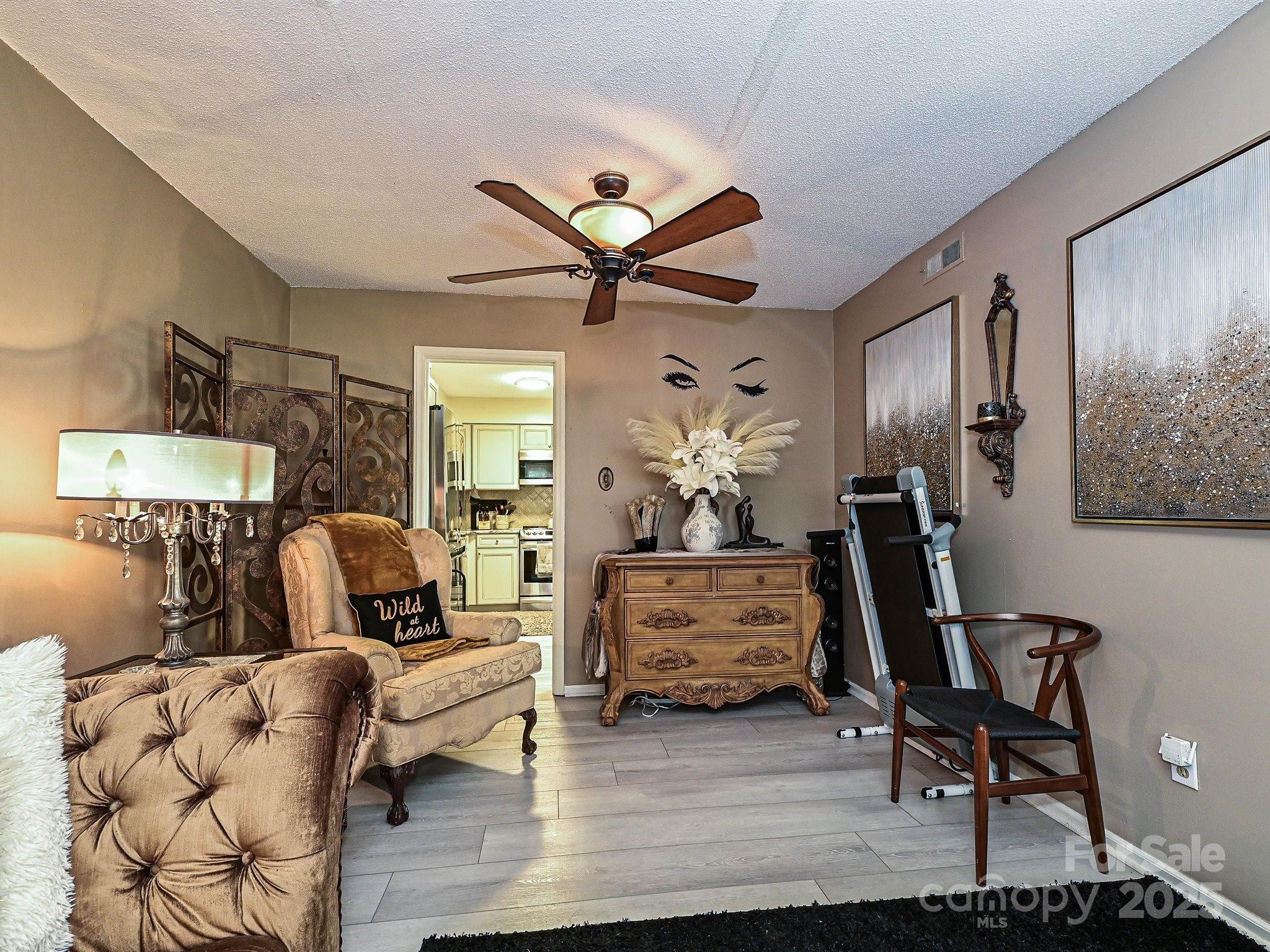 4520 Central Avenue, Unit H Charlotte, NC 28205 - Photo 5 of 28 a living room with furniture