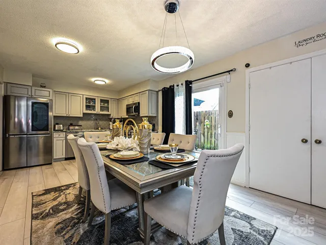 a view of a dining room with furniture