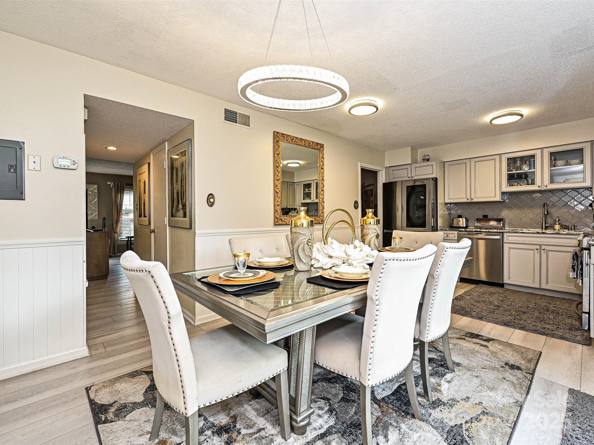 4520 Central Avenue, Unit H Charlotte, NC 28205 - Photo 9 of 28 a dining room with furniture and window