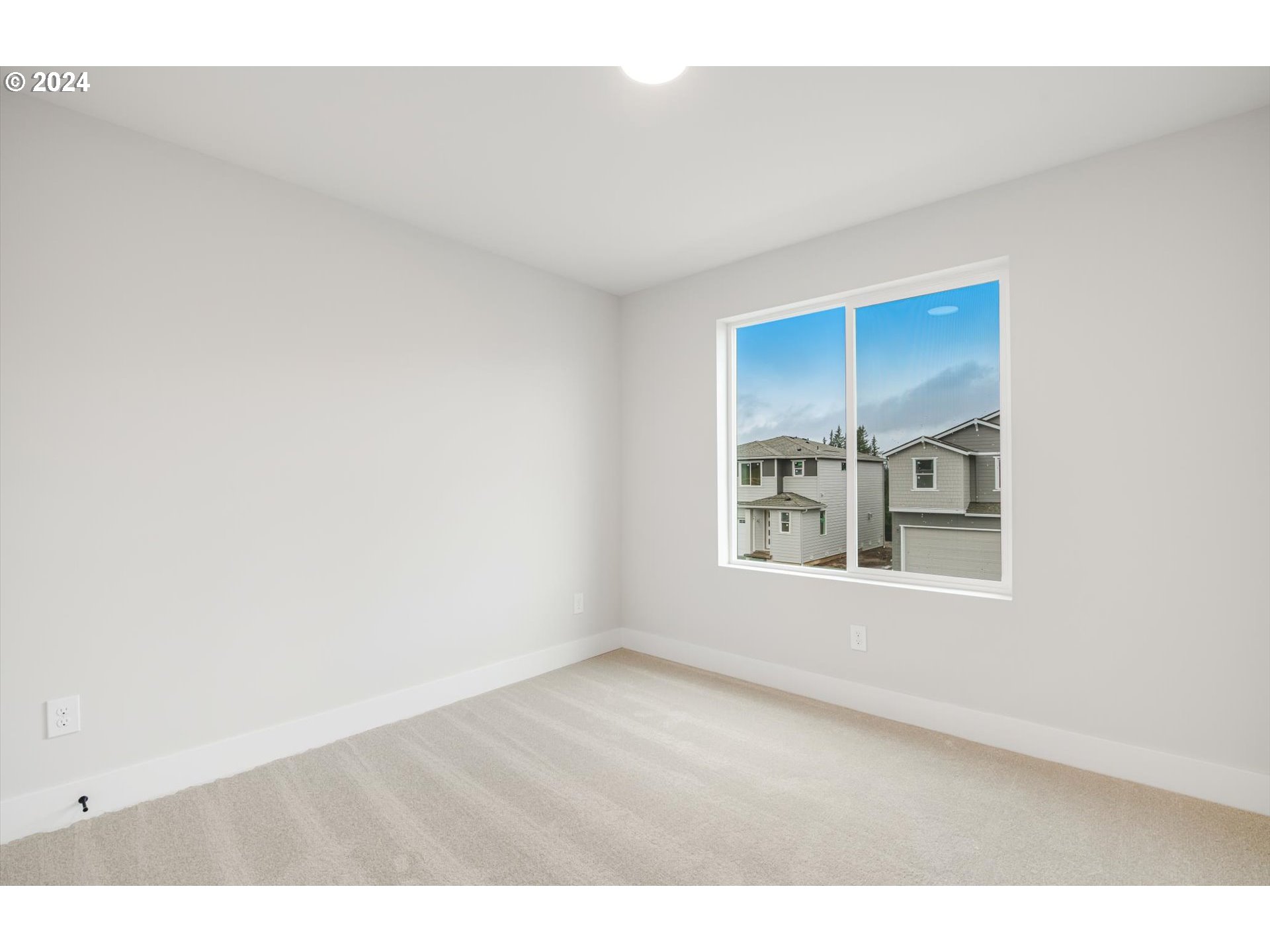 3865 West 4th Street Washougal, WA 98671 - Photo 22 of 24 a view of an empty room with a window