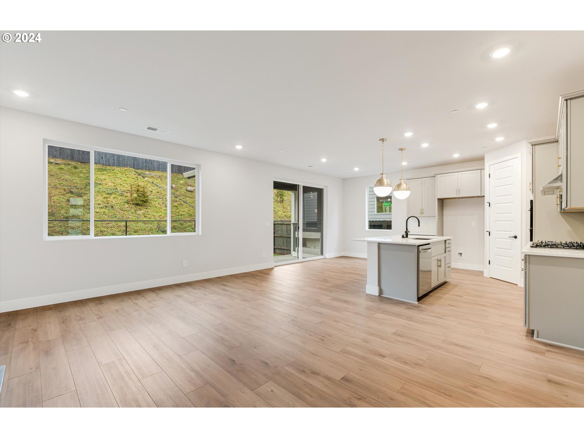 3865 West 4th Street Washougal, WA 98671 - Photo 4 of 24 a view of kitchen with sink and wooden floor