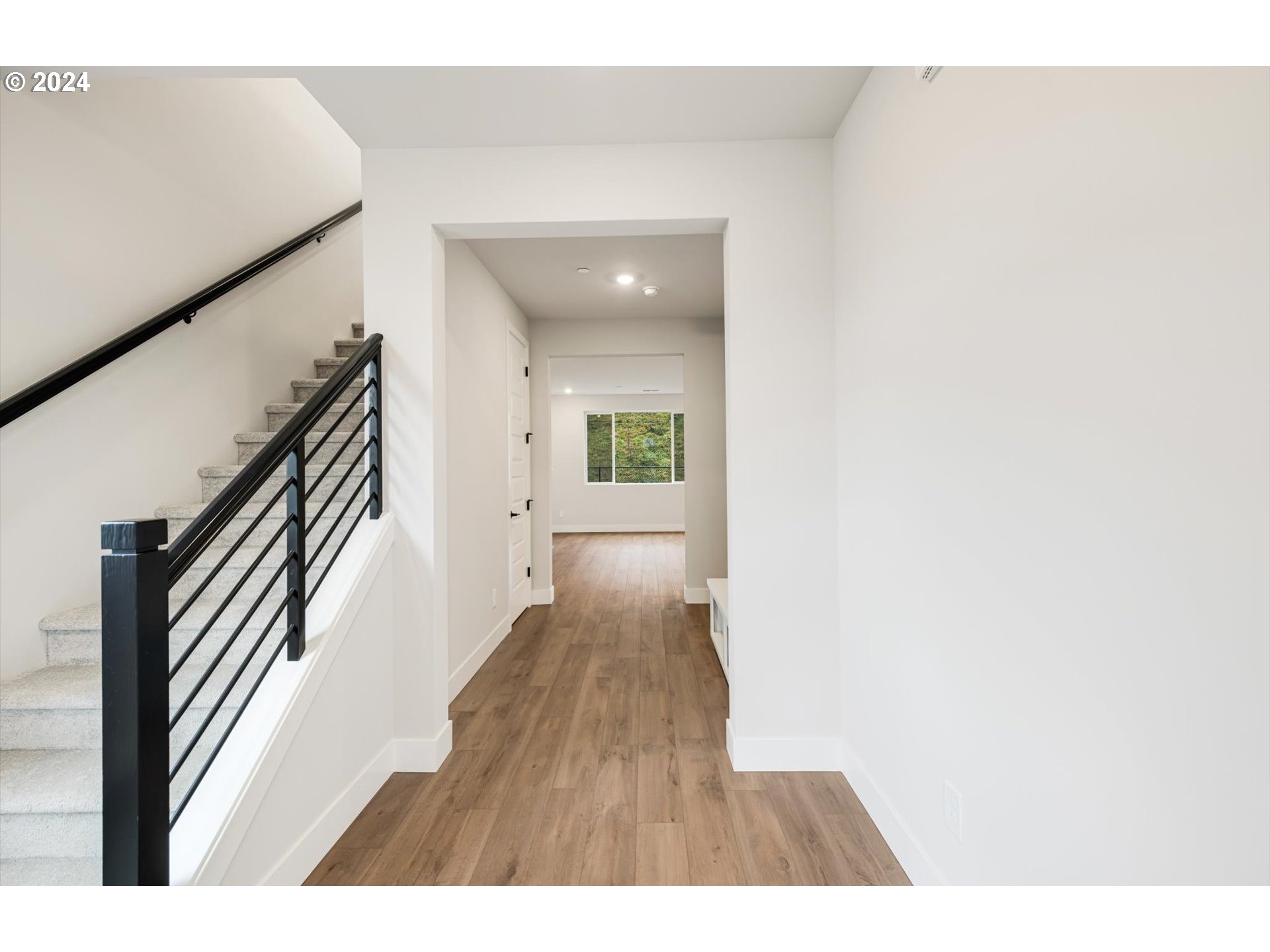 3865 West 4th Street Washougal, WA 98671 - Photo 6 of 24 a view of a hallway with wooden floor
