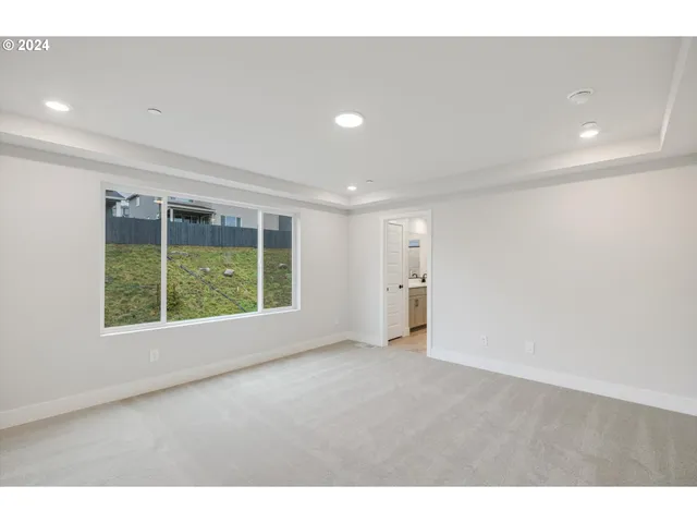 a bathroom with a double vanity sink a mirror a shower and vanity