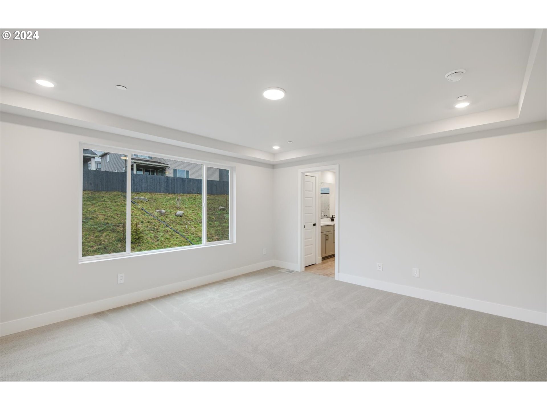3865 West 4th Street Washougal, WA 98671 - Photo 10 of 24 a view of an empty room with a window