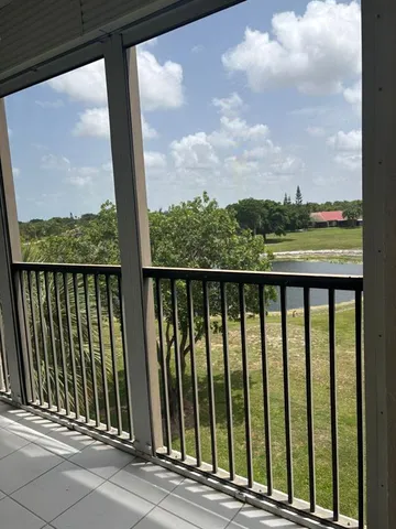 a view of a balcony with an outdoor space
