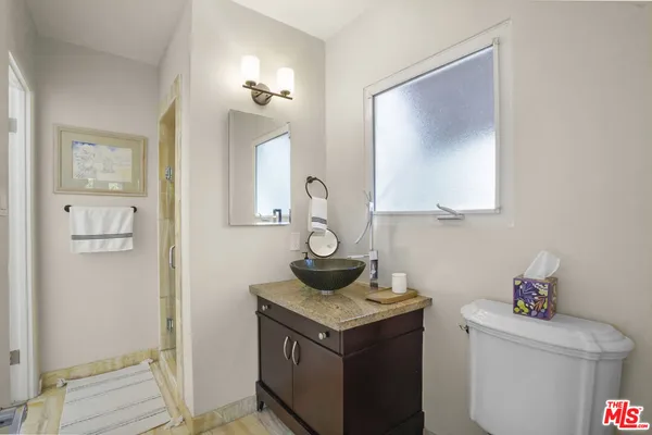 a view of a storage and utility room in a house