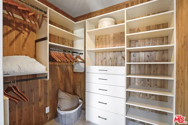 a bathroom with a toilet a sink and a shower