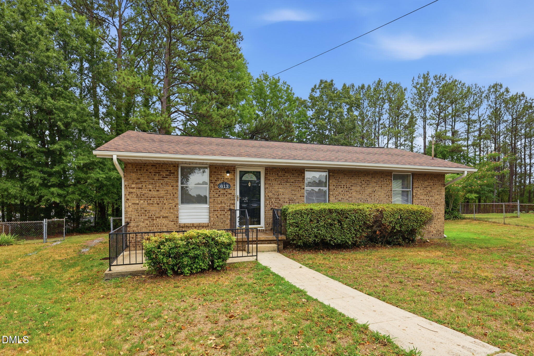 613 Juno Court Raleigh, NC 27610 - Photo 2 of 29 front view of a house with a yard