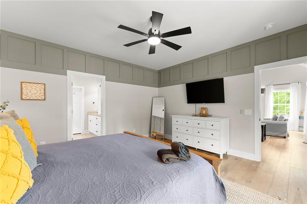 1320 Preacher Campbell Road Clarkesville, GA 30523 - Photo 13 of 36 a bedroom with furniture and flat screen tv