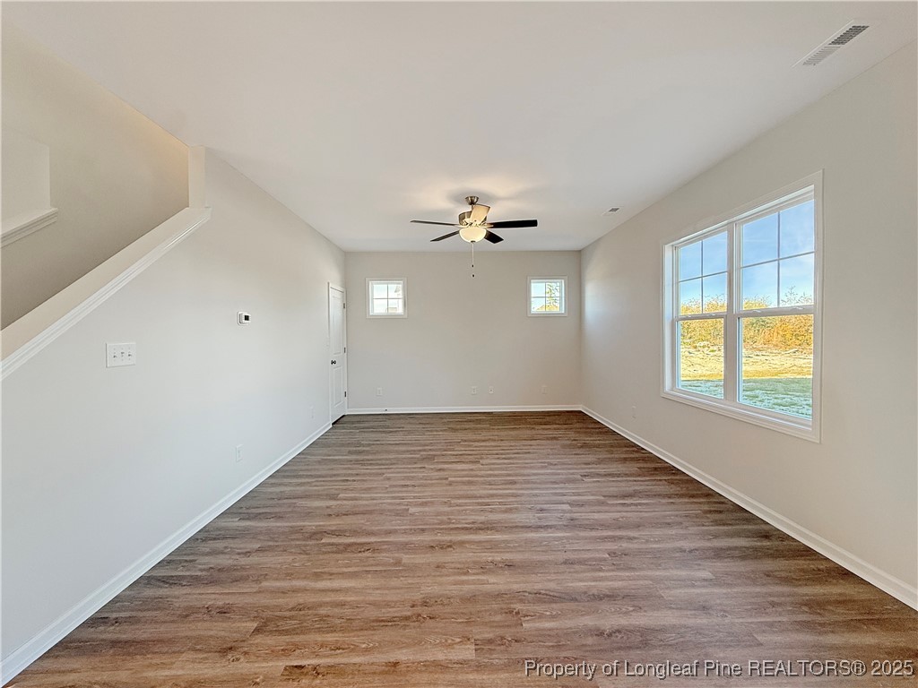 514 Ashley Heights Raeford, NC 28376 - Photo 15 of 39 wooden floor in an empty room with a window