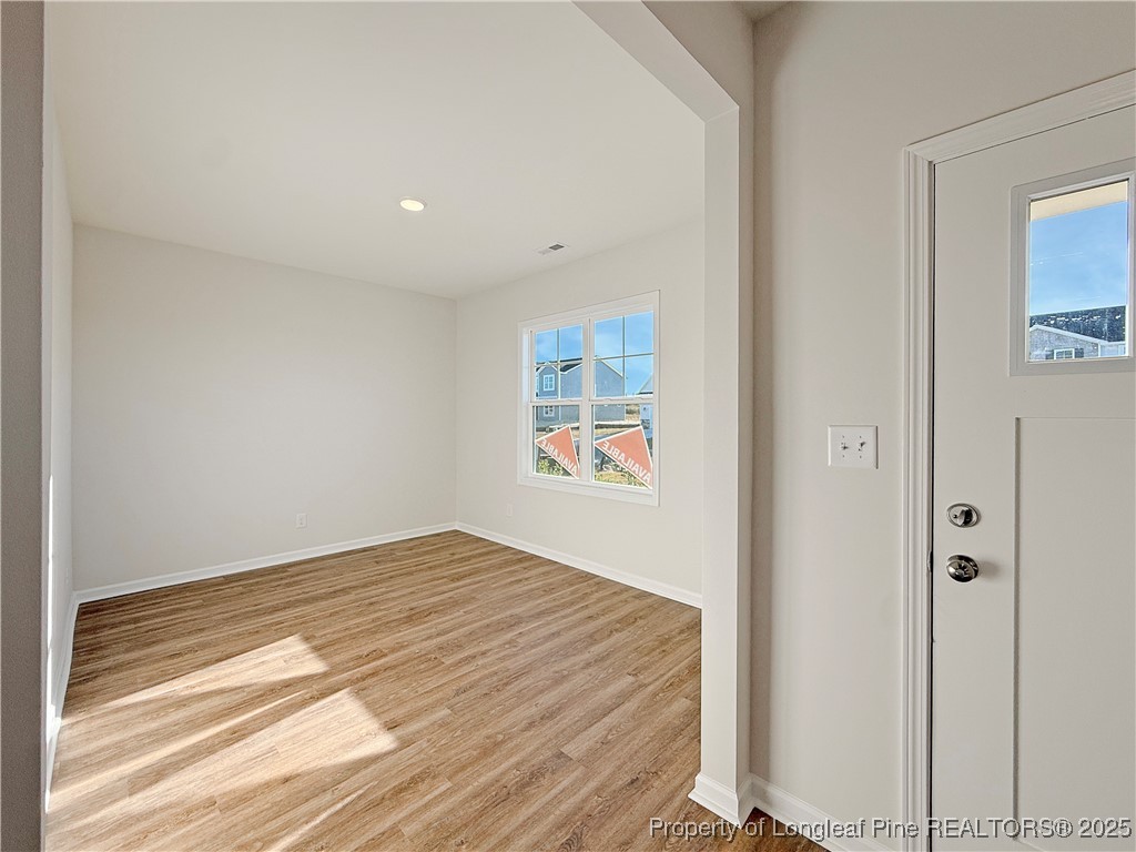 514 Ashley Heights Raeford, NC 28376 - Photo 5 of 39 a bedroom with a bed and a window