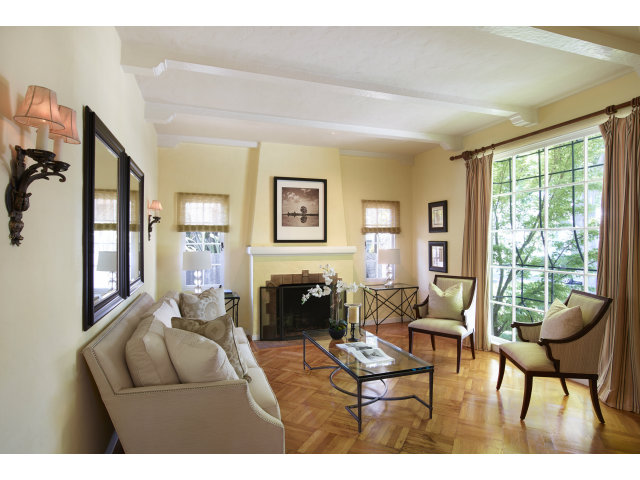 215 Channing Road Burlingame, CA 94010 - Photo 3 of 11 a living room with furniture and a fireplace