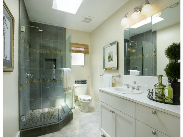 215 Channing Road Burlingame, CA 94010 - Photo 7 of 11 a bathroom with a shower sink and mirror