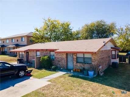 a view of a house with a patio