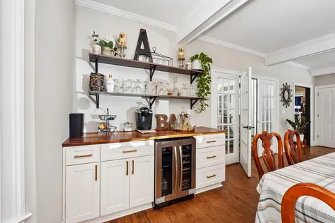 a kitchen with stainless steel appliances a stove a sink and a refrigerator