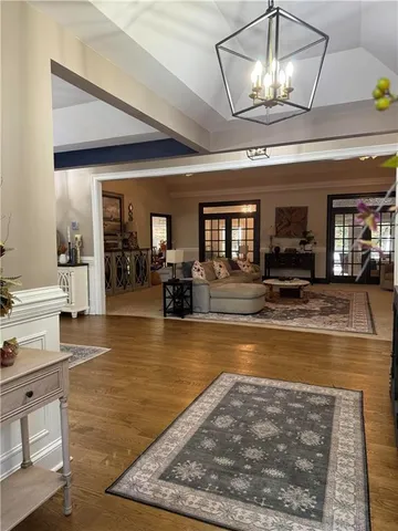 a view of a living room and kitchen