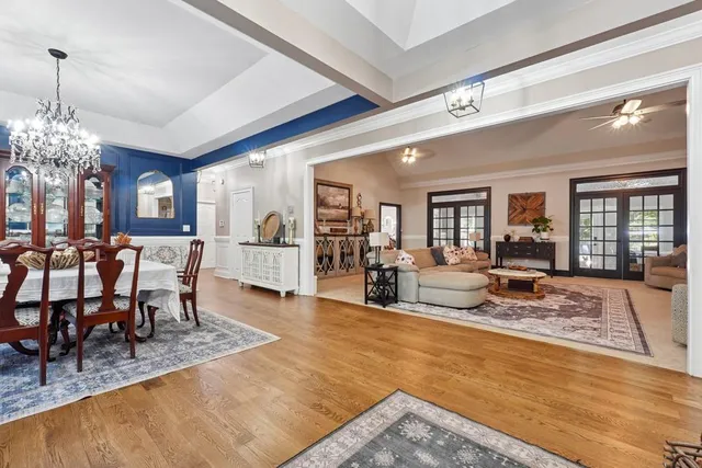 a view of a livingroom with dining room and kitchen view