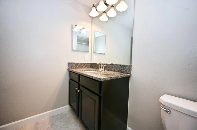 a bathroom with a sink and a toilet