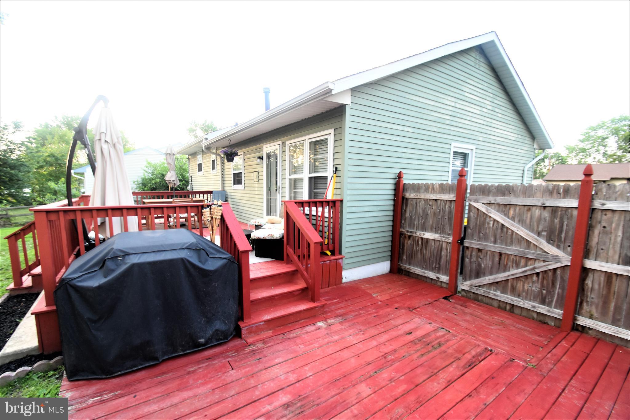 104 Patricia Road Newark, DE 19713 - Photo 38 of 48 HUGE Rear Deck. Fenced Yard. Patio too.