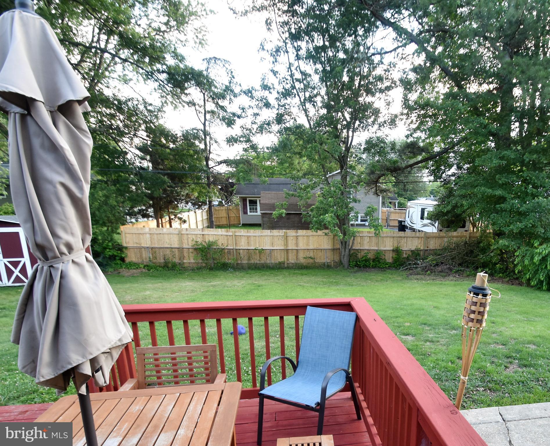 104 Patricia Road Newark, DE 19713 - Photo 40 of 48 HUGE Rear Deck. Fenced Yard. Patio too.