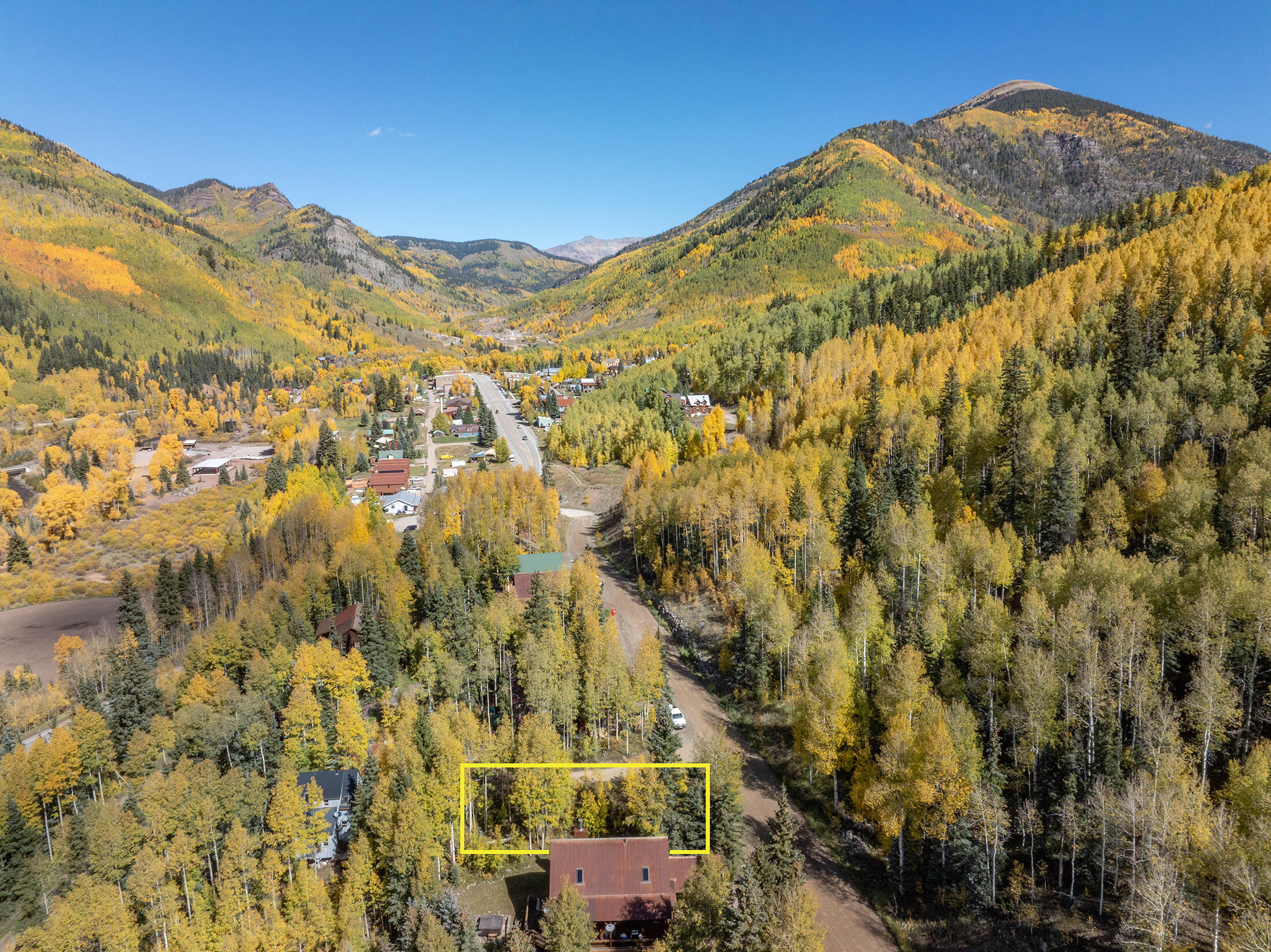 Tbd Silverglance Way Rico, CO 81332 - Photo 17 of 18 a view of a large building with mountains in the background