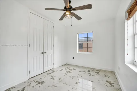 a view of a livingroom with a window