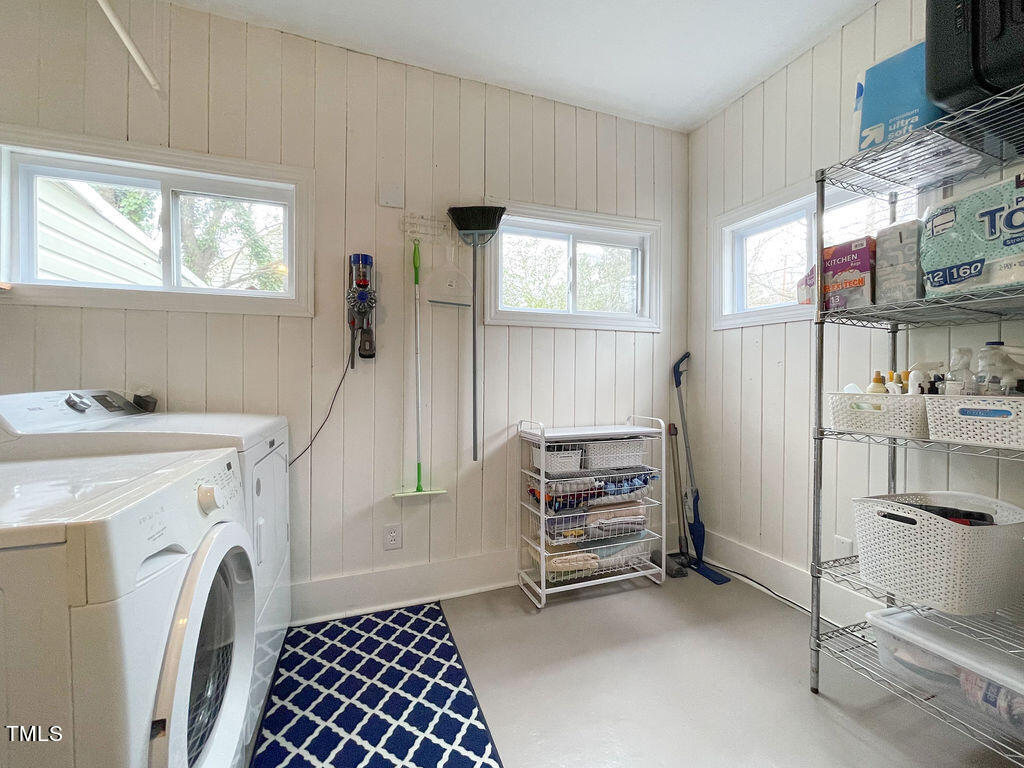 301 Colleton Road Raleigh, NC 27610 - Photo 11 of 14 a view of livingroom with washer and dryer windows