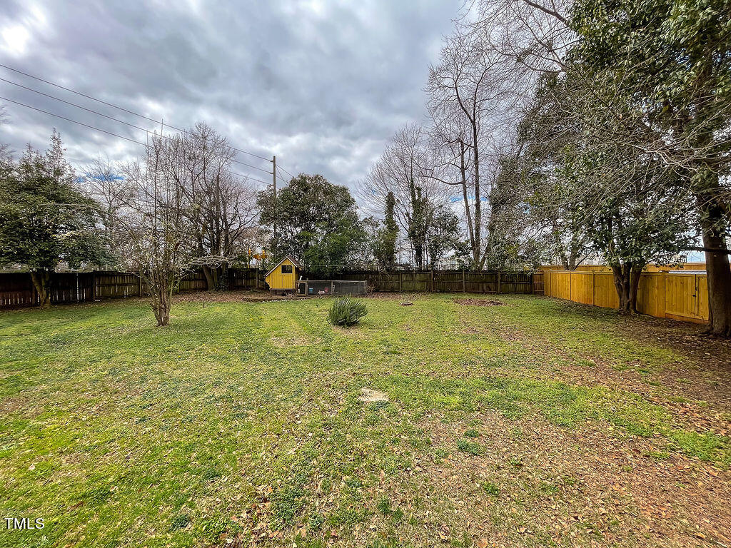 301 Colleton Road Raleigh, NC 27610 - Photo 12 of 14 a view of a lake with houses